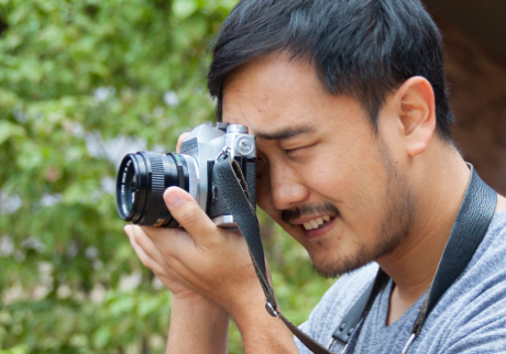 faa-male-photo-800x560 Male student holding camera